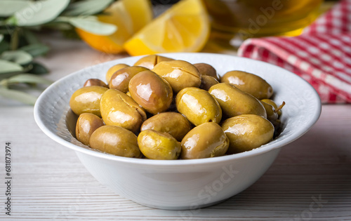 Cracked green olives. Crack...