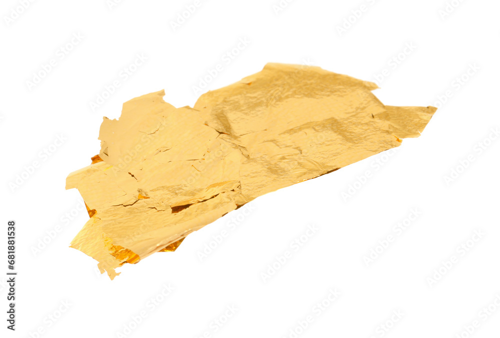 Piece of edible gold leaf isolated on white Piece of edible gold leaf isolated on white