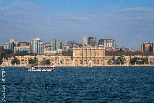 View of Dolmabahce Palace in Besiktas district on the European shore of the Bosphorus Strait on a sunny day  Istanbul  Turkey