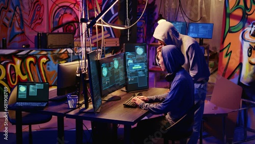 Hackers in hidden base excited after successfully getting past anti tamper measures implemented by companies to protect their products. Crackers happy after pirating software and video game releases