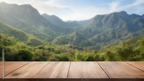 empty wood table top on blur background of mountain
