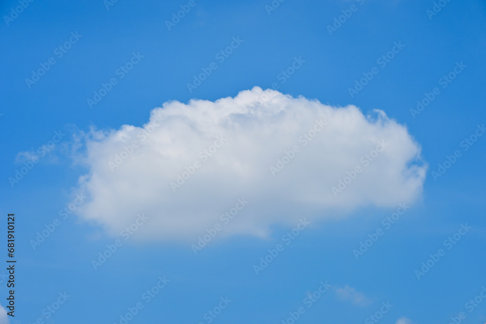 beautiful blue sky and white fluffy single cloud with sunrise in the morning, natural background beautiful blue sky and white fluffy single cloud with sunrise in the morning, natural background