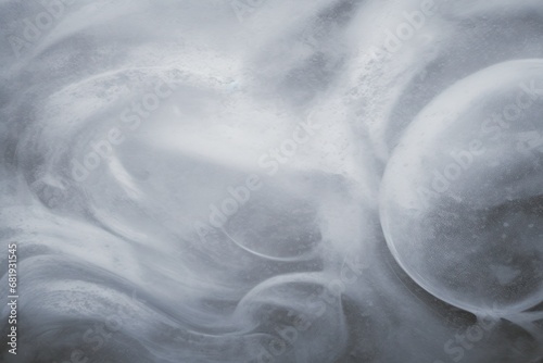 Soft swirls of misty gray smoke, perfect for atmospheric effects in design, abstract backgrounds, or visual art.