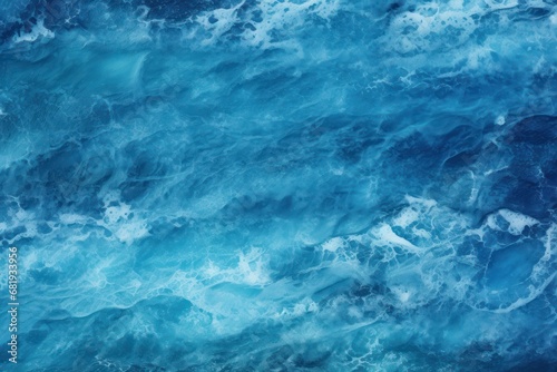 Tranquil blue watercolor texture simulating the ocean s surface  ideal for serene backgrounds or aquatic themes.