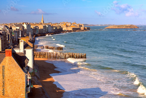 Sunny aerial view of beautiful walled port city of Saint-Malo at high tide, Brittany, France