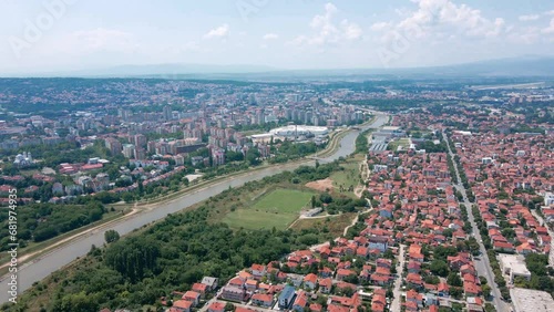Aerial view of river Nisava in city of Nis, Serbia and surrounding houses and buildings photo