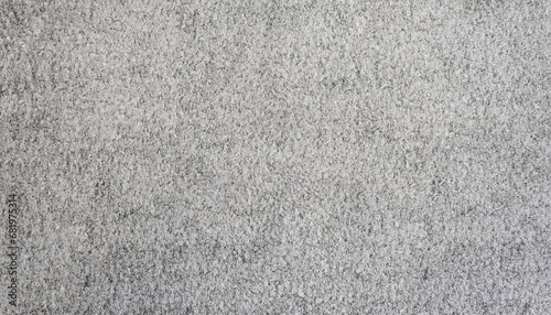 grey carpet texture background. grey carpet in cement wall pattern for rustic mood. interior floor covering material.