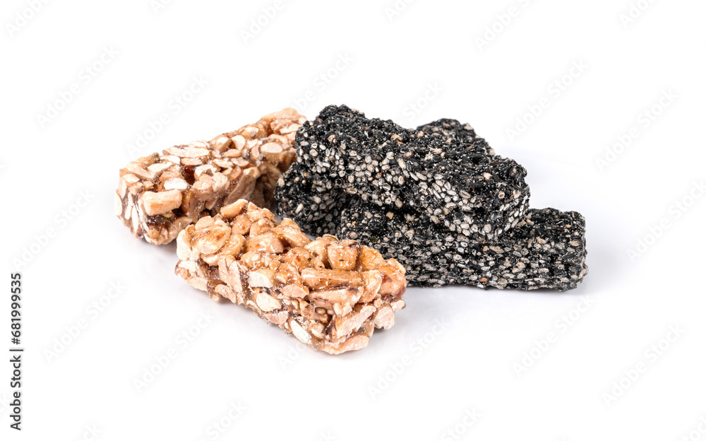 A set of different gozinaki dessert bars isolated on white background A set of different gozinaki dessert bars isolated on white background