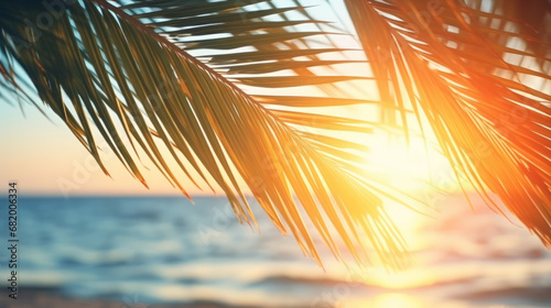 Palm leaves on tropical sunset beach background. Summer and travel concept. Generative ai. © tonktiti