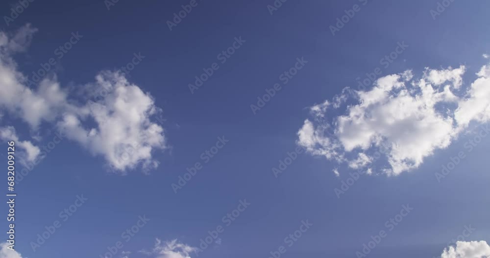 Rare clouds against the blue sky on a summer day Rare clouds against the blue sky on a summer day