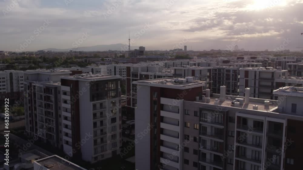 A drone flies over newly built high-rise buildings A drone flies over newly built high-rise buildings