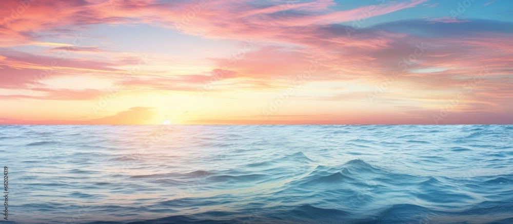 As the sun sets over the endless horizon, the turquoise waves of the vast ocean reflect the colors of a beautiful, colorful marine life, captivating anyone who embraces the beauty of nature and its As the sun sets over the endless horizon, the turquoise waves of the vast ocean reflect the colors of a beautiful, colorful marine life, captivating anyone who embraces the beauty of nature and its
