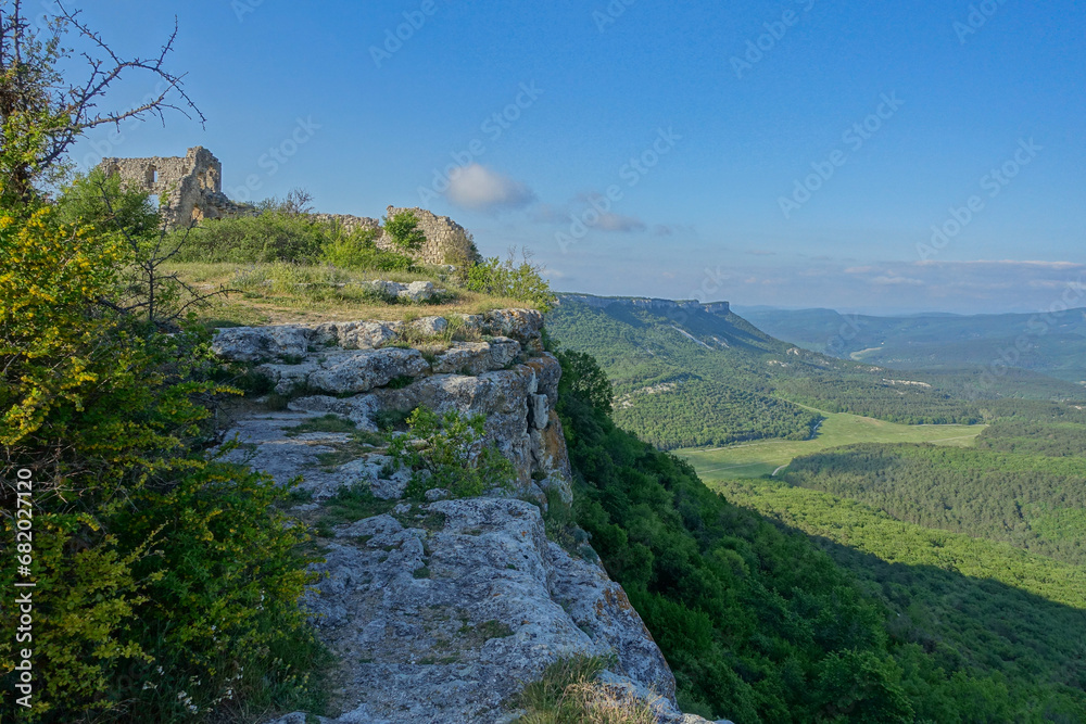 Mangup-Kale cave city, sunny day. Mountain view from the ancient cave town of Mangup-Kale in the Republic of Crimea, Russia. Bakhchisarai.