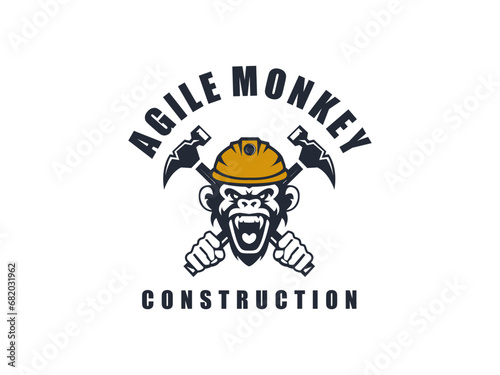 Badge logo of a helmeted monkey character carrying a hammer for construction