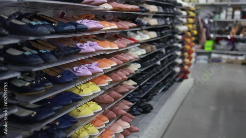 Rack with shoes in a store photo