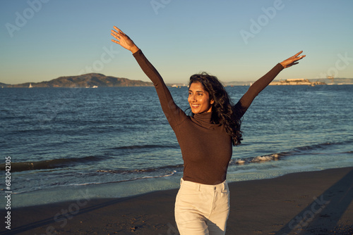 Indian Woman Flowing or Dancing Happily at The Beach 
