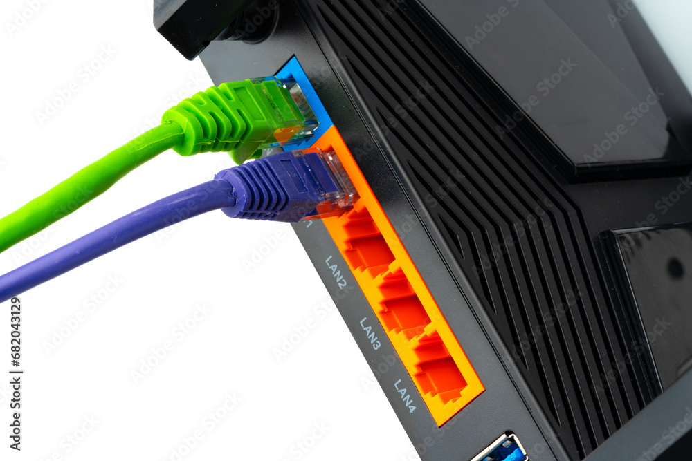 Modern router with cables plugged in close up Modern router with cables plugged in close up