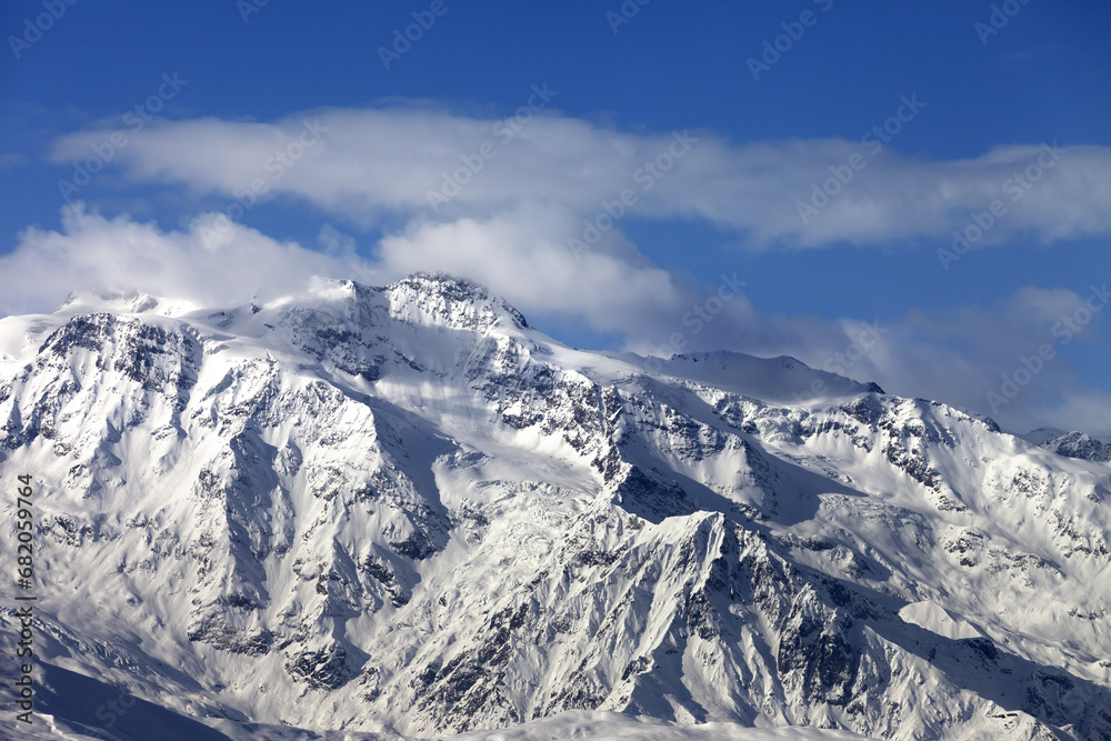 Winter snowy mountains at nice sunny day