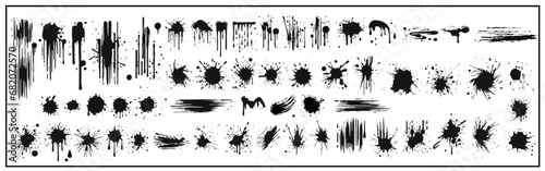 A collection of spots and stains. Black ink stains and dirt spots scattered with isolated drops and spots. Urban street style ink blots, dots or lines. Isolated vector illustration photo