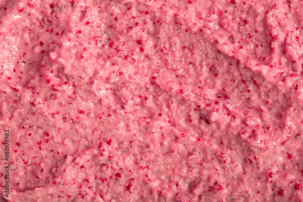Berry yoghurt ice cream. Smoothies from fresh fruits and berries. Ice cream texture. Delicious sweet dessert close-up as a background. Berry yoghurt ice cream. Smoothies from fresh fruits and berries. Ice cream texture. Delicious sweet dessert close-up as a background.