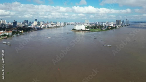 Aerial drone footage above the Mekong and Tonle Sap in Phnom Penh, Cambodia. Camera is moving foward to Chroy Changvar peninsula photo