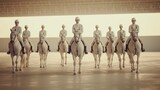 equestrian team practices synchronized riding routines.