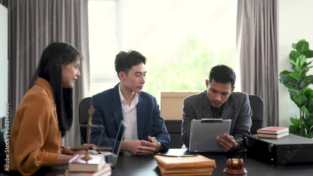 business people and lawyers discussing contract papers sitting at the table. Concepts of law, advice, legal services. . business people and lawyers discussing contract papers sitting at the table. Concepts of law, advice, legal services. .