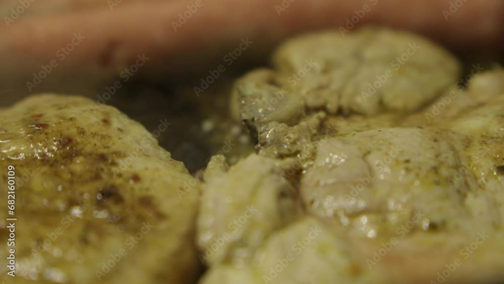 Close up view of some smelt cutlets and sausages frying in a pan. Close up view of some smelt cutlets and sausages frying in a pan.