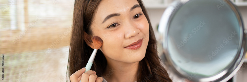 Beautiful women with social media influences are teaching makeup and use cosmetics, In front of the camera to recording vlog video live streaming, Online business on concept of beauty bloggers. Beautiful women with social media influences are teaching makeup and use cosmetics, In front of the camera to recording vlog video live streaming, Online business on concept of beauty bloggers.