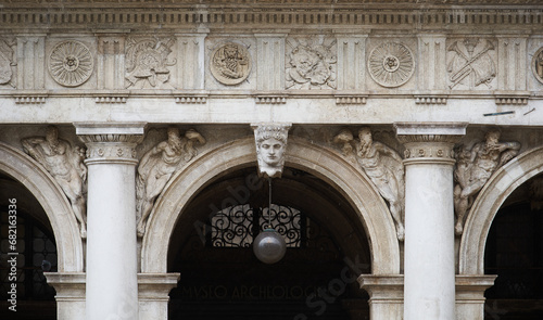 Entrance of Marciana Library or Library of Saint Mark (Italian: Biblioteca Marciana on St. Mark’s Square. Venice - 5 May, 2019 photo