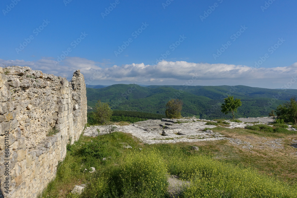 Mangup-Kale cave city, sunny day. Mountain view from the ancient cave town of Mangup-Kale in the Republic of Crimea, Russia. Bakhchisarai.