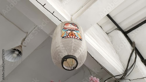 Japanese lanterns decorating the front of the house