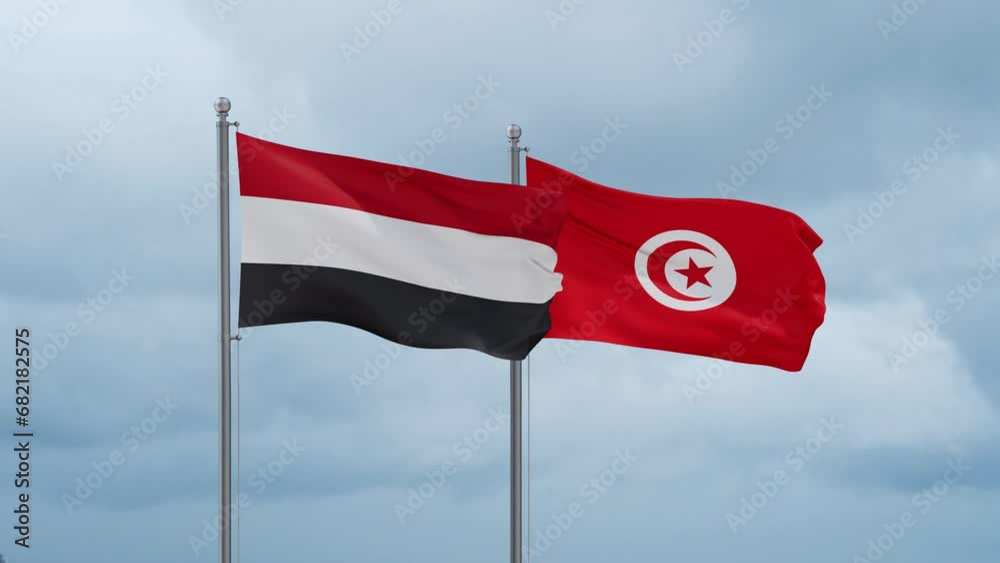Tunisia and Yemen flag waving together on cloudy sky, endless seamless loop, two country cooperation concept Tunisia and Yemen flag waving together on cloudy sky, endless seamless loop, two country cooperation concept