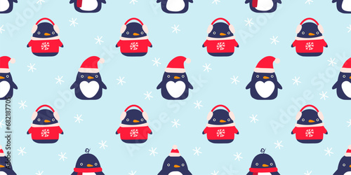 Christmas seamless pattern with cute cartoon penguins and snowflakes. Cartoon winter characters. Can be used for fabric  wrapping paper  scrapbooking  textile  poster  banner and other christmas