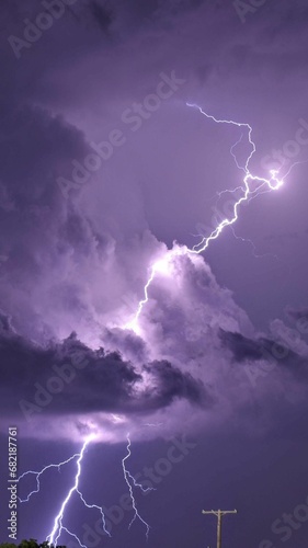 Powerful lightning bolt streaks through the night sky