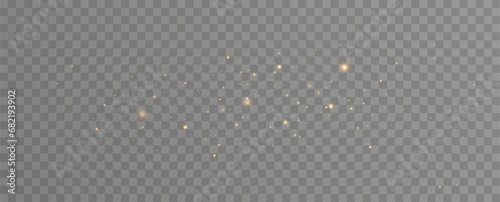 Golden sequins glow with many lights. Glittering dust. Luxurious background of golden particles.	