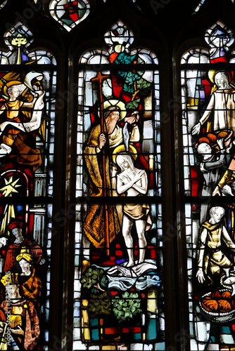 St Nicolas's church, Beaumont le Roger, Eure, France. Stained glass. St John baptizing Jesus.