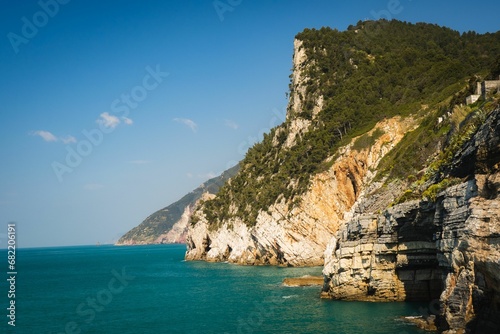 Scenic view of majestic cliffs surrounded by blue waters. Portofino, Italy