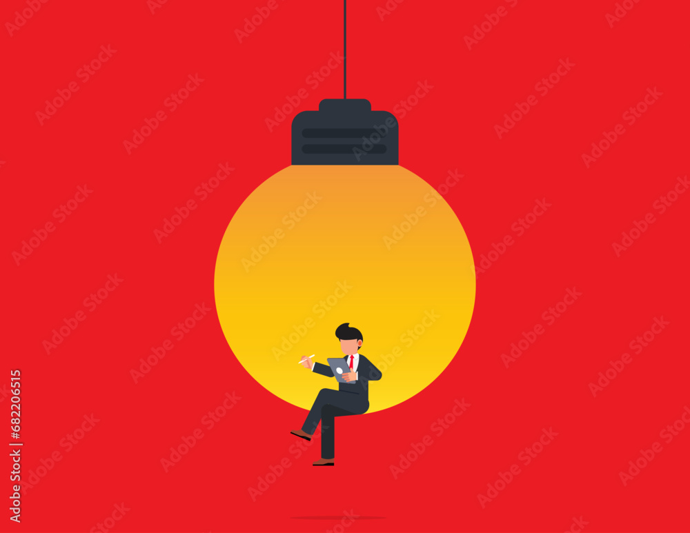Symbol of creativity. Businessman sitting in light bulb with laptop.