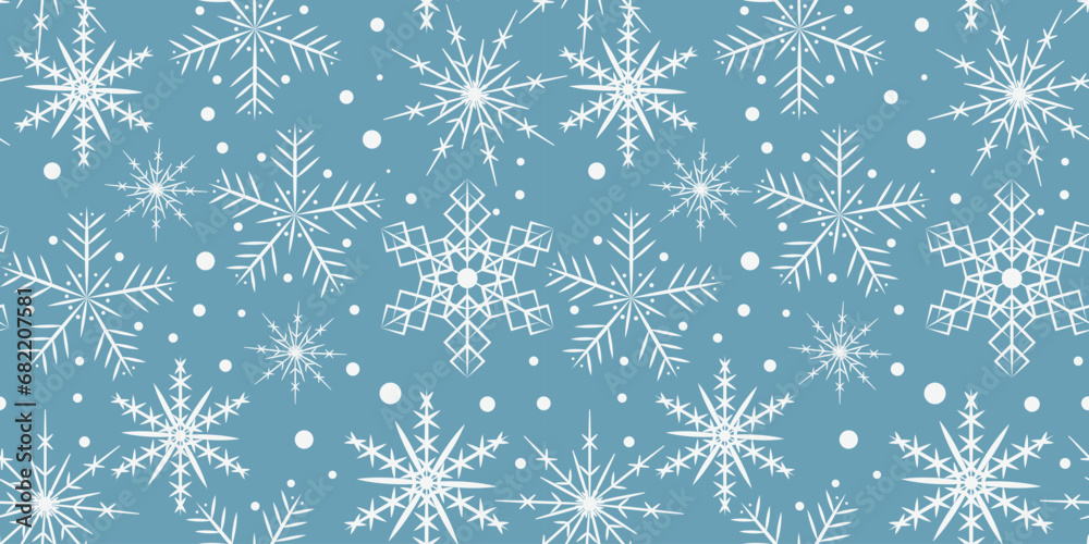 Blue seamless pattern with white snowflakes