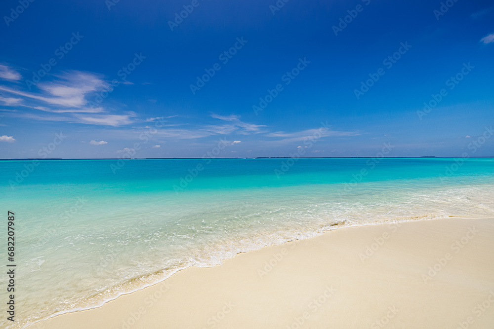 Nature landscape view of beautiful tropical beach and sea in sunny day. Beach waves inspire summer vacation. Nature of tropical Mediterranean beach sunlight. Light sand beach, ocean water sparkles