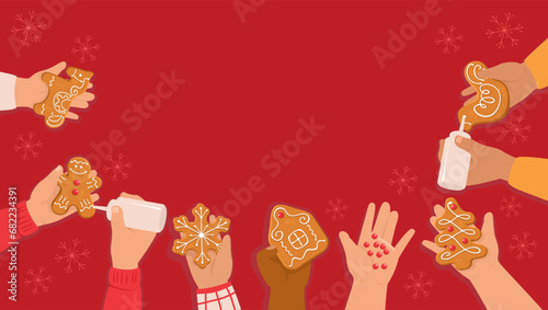Group of children decorating gingerbread cookies. Kid's hands with traditional winter biscuits