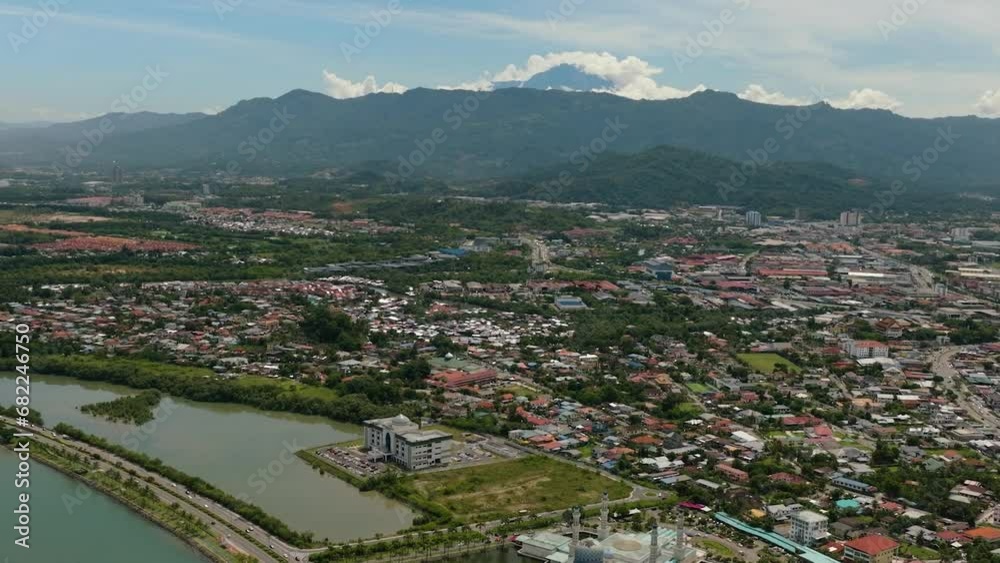 Aerial view of urban areas and buildings in the city of Kota Kinabalu. Borneo,Sabah, Malaysia. Aerial view of urban areas and buildings in the city of Kota Kinabalu. Borneo,Sabah, Malaysia.