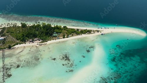 Aerial view of beautiful Sibuan island with a beach and a coral atoll. Tun Sakaran Marine Park. Borneo, Sabah, Malaysia. photo