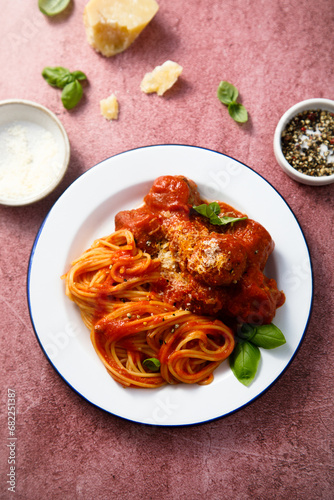 Spaghetti with meatballs and Parmesan cheese