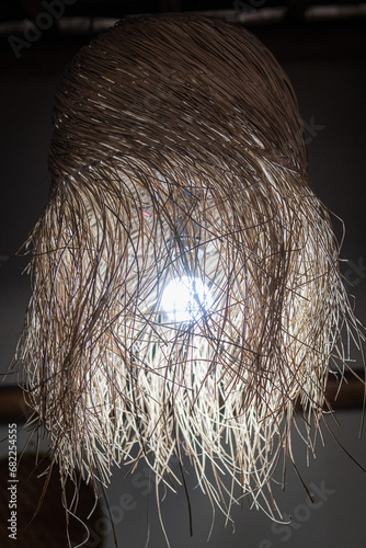Decorative lamp from dried leaf grass that become room ornaments