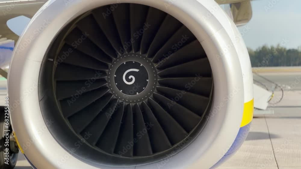 Jet engine of a big passenger aircraft at the airport Jet engine of a big passenger aircraft at the airport