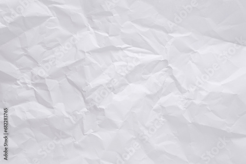 White crumpled paper texture background, clean white wrinkled paper, top view.