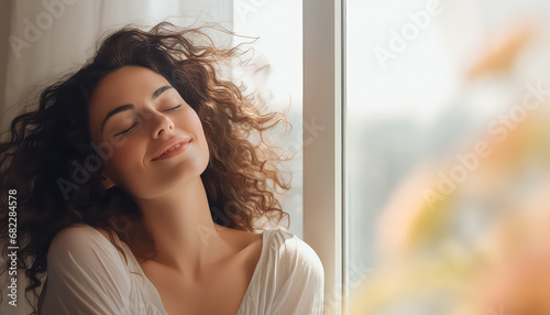 Woman with closed eyes enjoying silence afternoon nap, March 8 World Women's Day