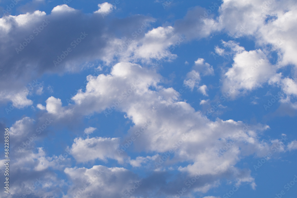 The vast blue sky and clouds sky background.